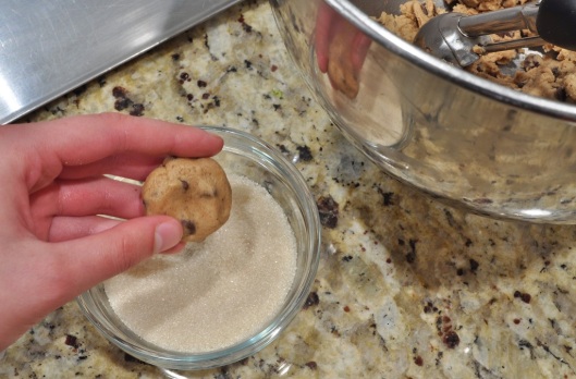 Press the top of the flattened cookie in sugar