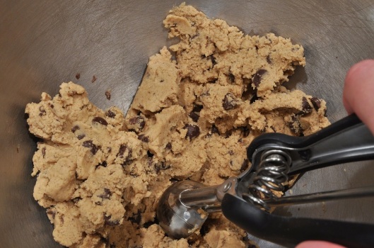 Scooping the dough for espresso cinnamon chip cookies
