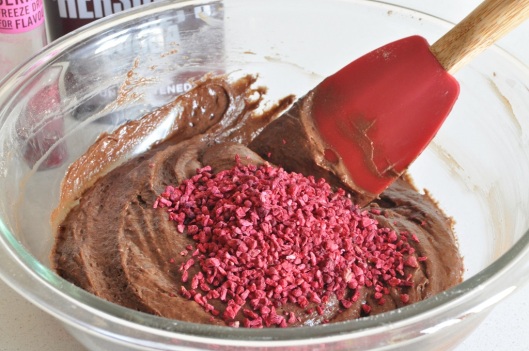 Add the raspberries to the brownie batter